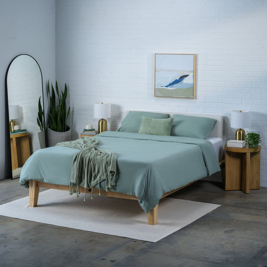 Clean bedroom and made bed