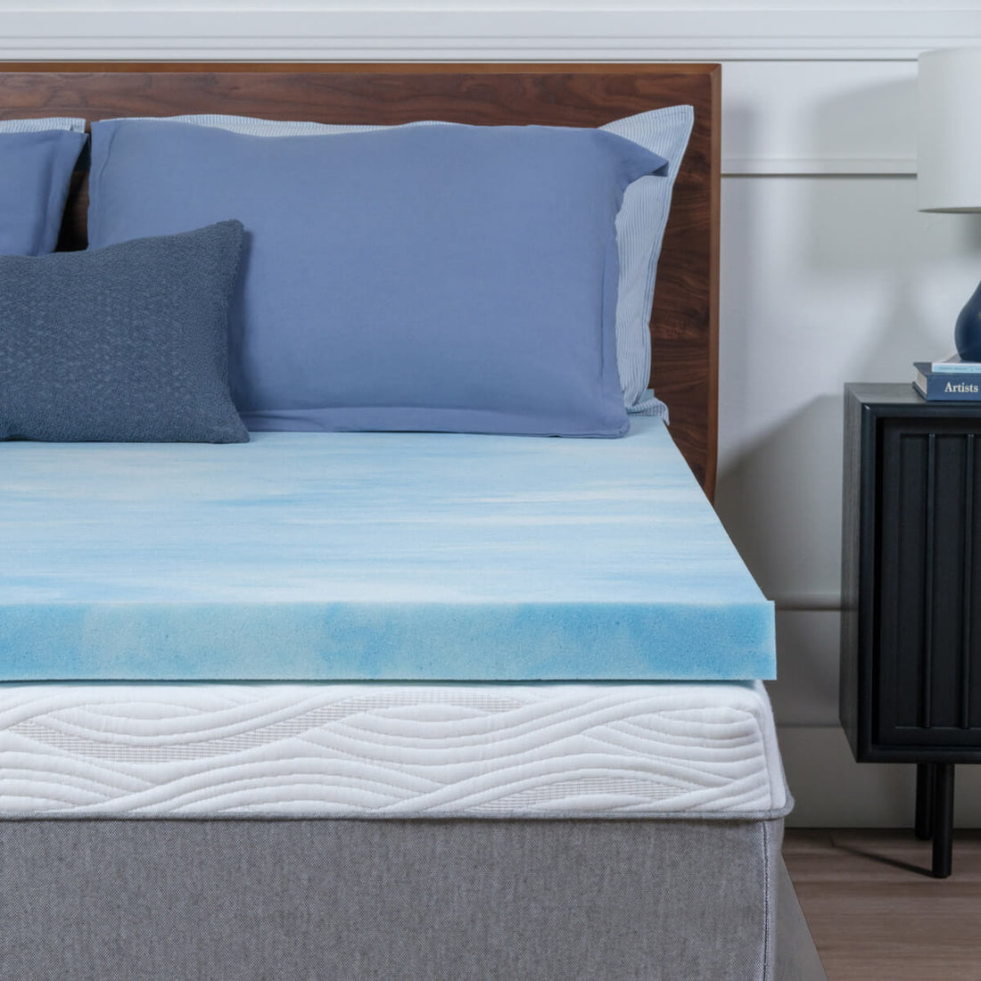 topper on bed