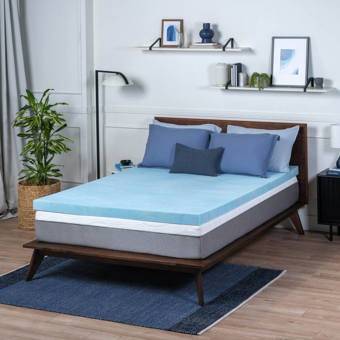 topper on bed